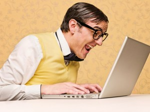 happy guy in front of his computer (practicing its coding skills ;))